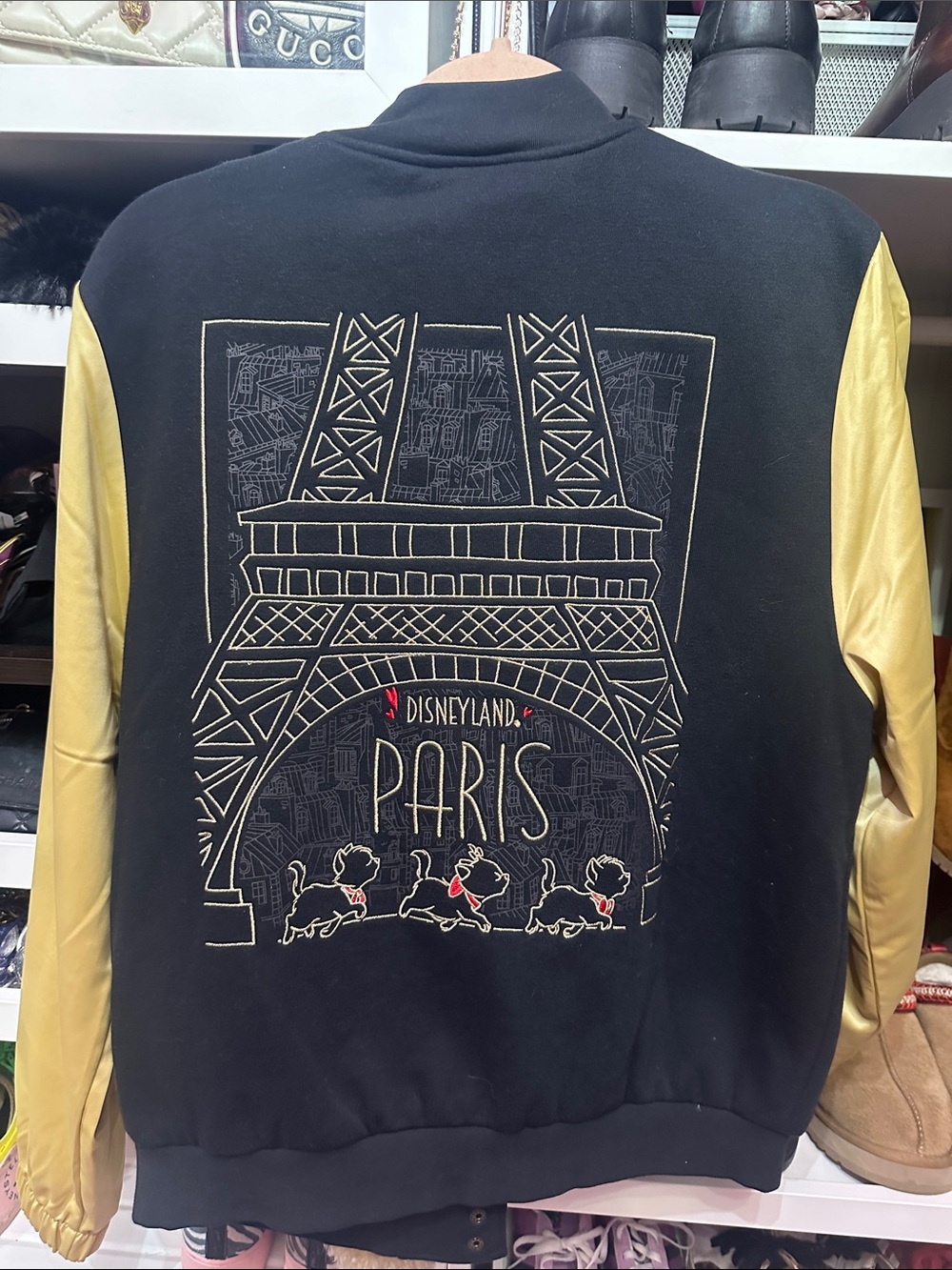 NWT Disneyland Paris, Aristocats, Black and Gold Varsity Jacket. Women Sz L